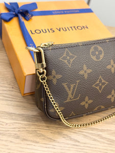 LOUIS VUITTON Monogram Canvas Mini Pochette Accessoires